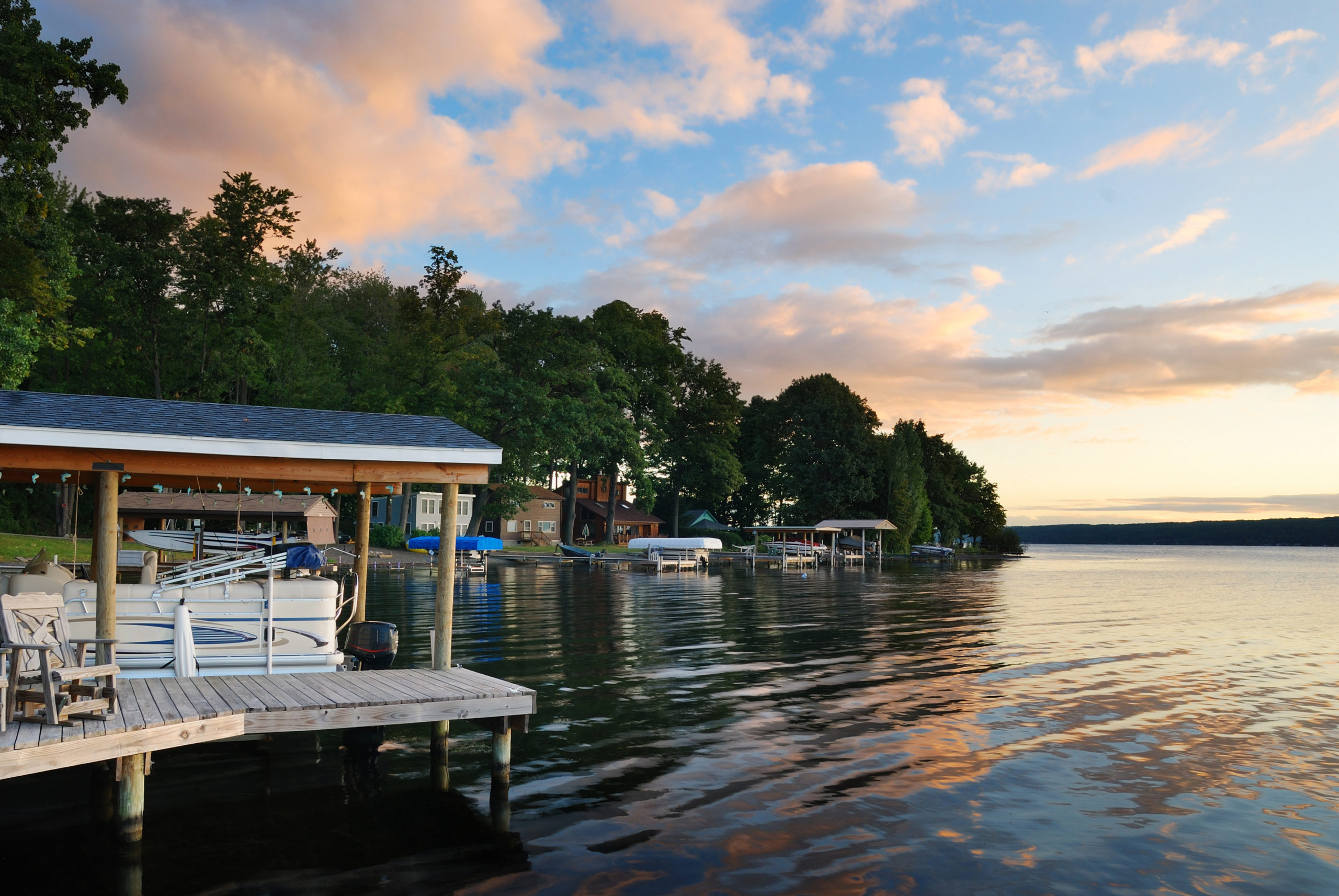 A boat house and dock on a lake in Central Texas